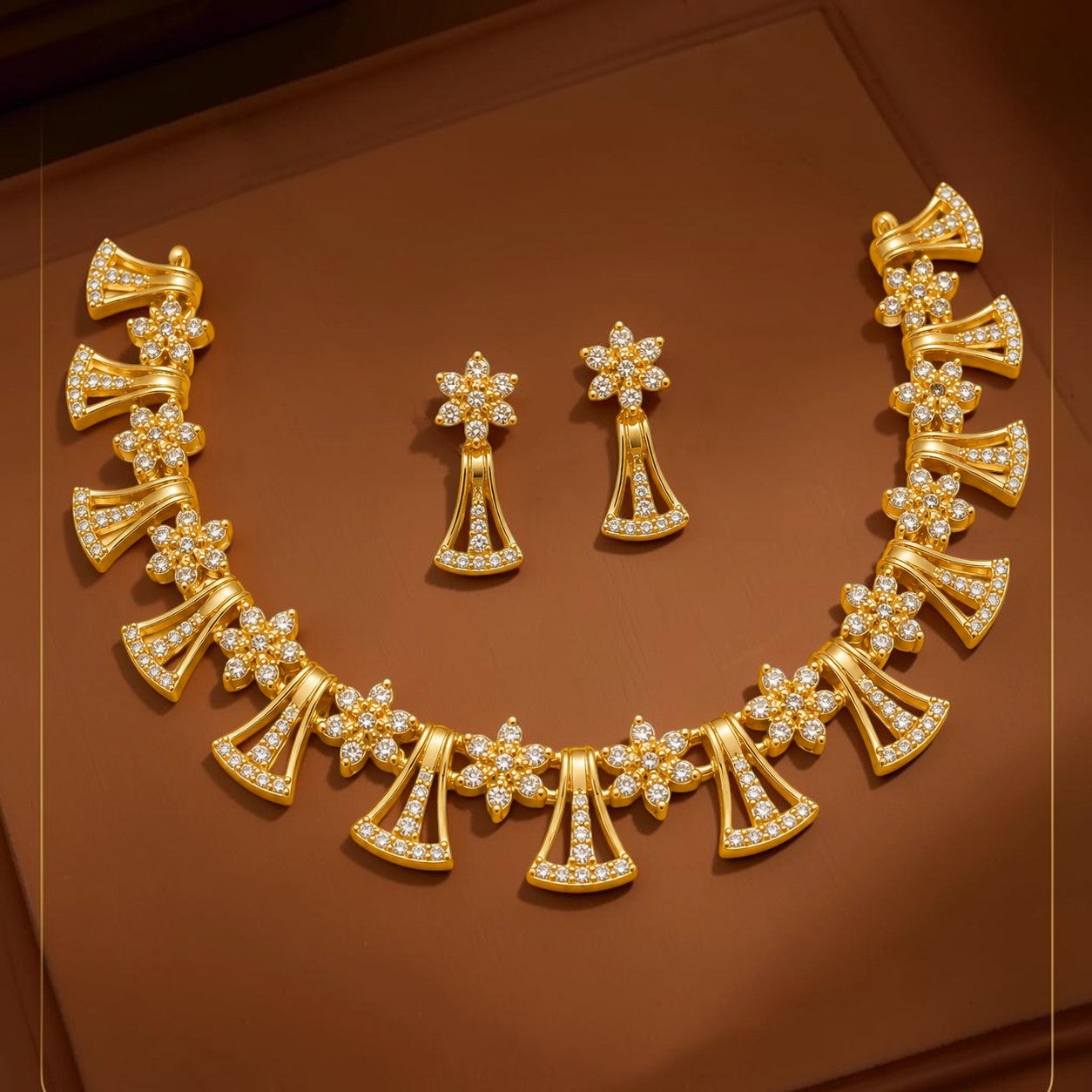 My Store gold-tone floral necklace and earring set with shimmering white stones and fan-shaped accents.