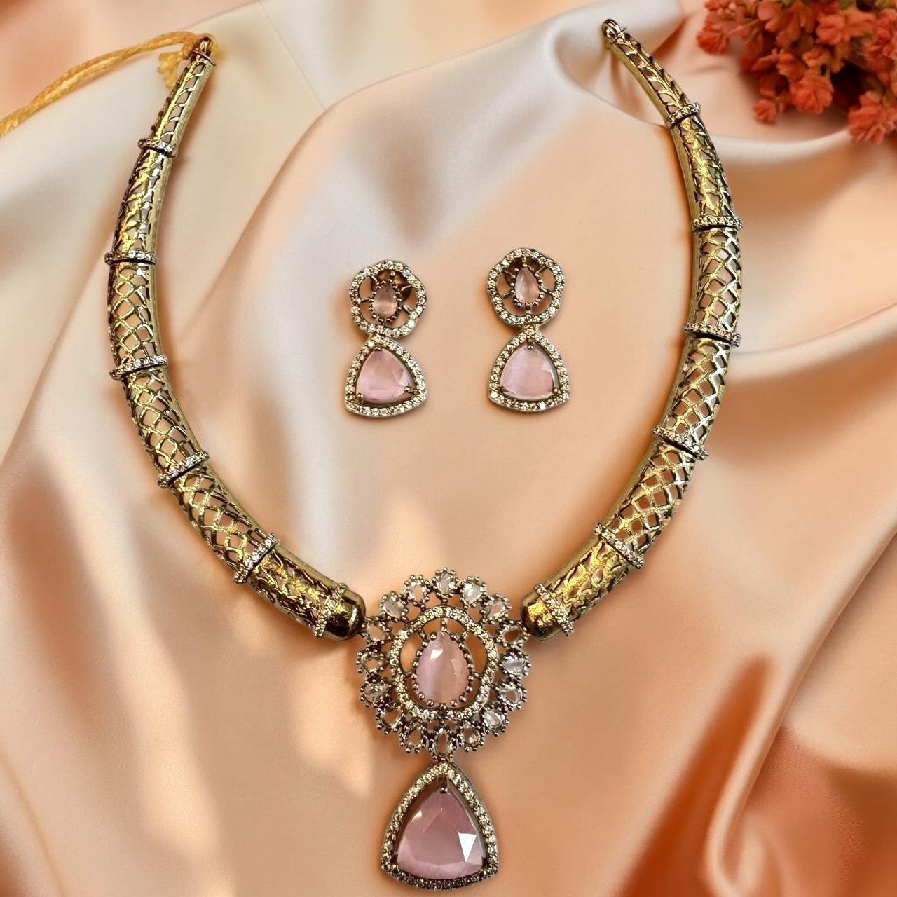 My Store Gulabi Noor gold-toned mesh collar necklace set with pink teardrop gemstones and matching drop earrings.