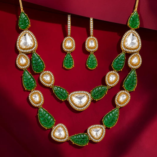My Store DuetLayer necklace and earring set featuring carved green emerald leaves and polki diamonds on gold