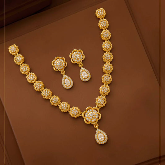 My Store gold-tone floral necklace and earring set with shimmering white stones and teardrop accents.