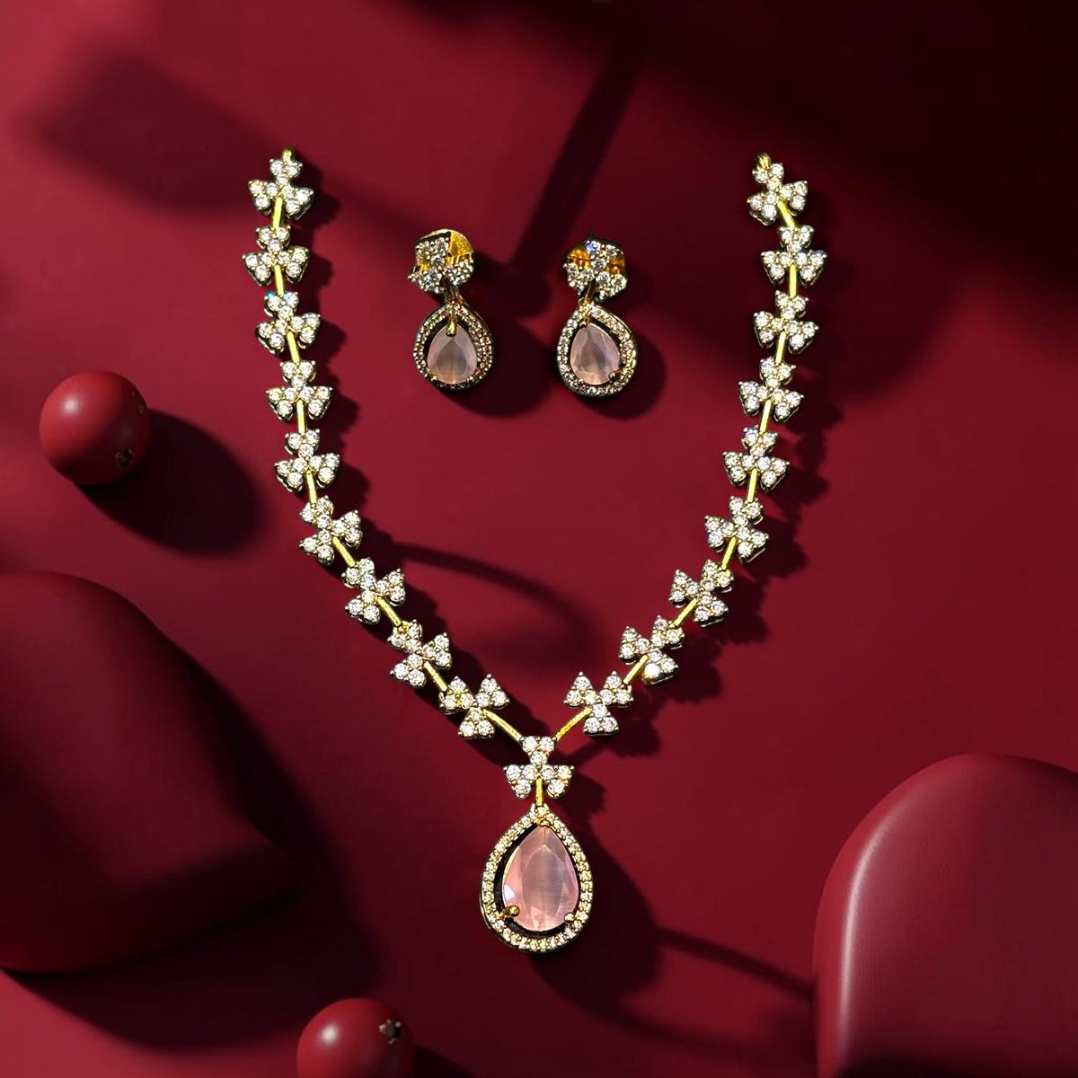 My Store elegant gold-tone necklace and earring set with sparkling floral motifs and pink teardrop gemstones