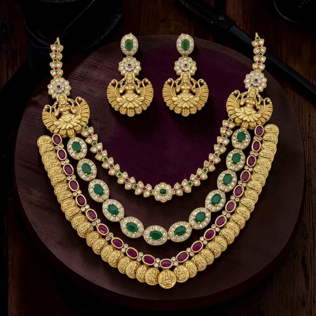 My Store traditional temple jewelry necklace and jhumka earring set with deity motifs, green and ruby stones, and coins.