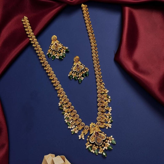 My Store Temple Majesty gold-toned temple necklace set with intricate motifs, deep-toned stones, and green bead drops.