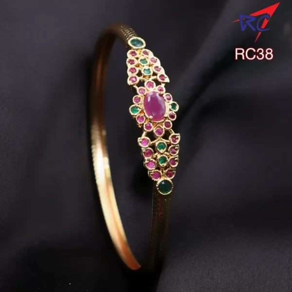 Ruby stone oval shape flower design gold finish Bracelet