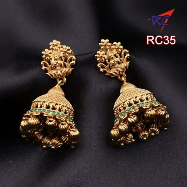 Antique finish Lakshmi with floral design balls hanging Jhumka set